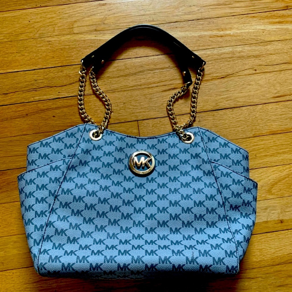 Blue Micheal Kors bag with chain shoulder straps